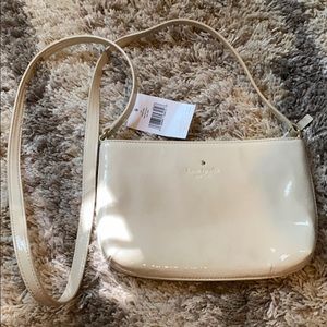Kate space beige/bone color cross body purse
